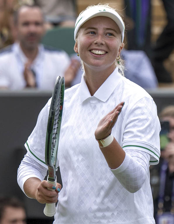 Clara Tauson (DEN) reacts after her victory in her match against Elena Rybakina (KAZ) in the Third Round of the Ladies' Singles on No.2 Court at The Championships 2025. Held at The All England Lawn Tennis Club, Wimbledon. Day 6 Saturday 05/07/2025. Credit: AELTC/Jonathan Nackstrand.